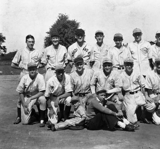 21-Pee Wee Reese bat boy sitting in front